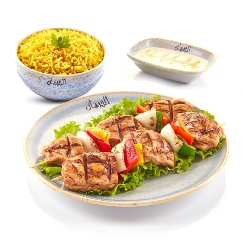 A quarter  of shish tawook basmati rice and salad
